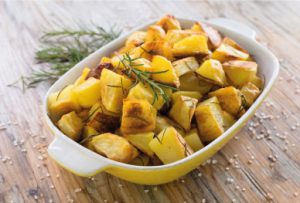 Bowl of Christmas roast potatoes - Take Stock magazine