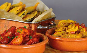 Patatas Bravas with Chorizo, Spicy Tomato & Basil Sauce, Andalucìan Chicken, Toasted Pine Nuts, Sherry & Cinnamon, & McDougalls Aubergine Fritters