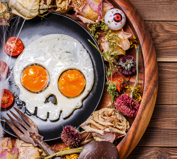 Fried eggs in the shape of a cartoon skull