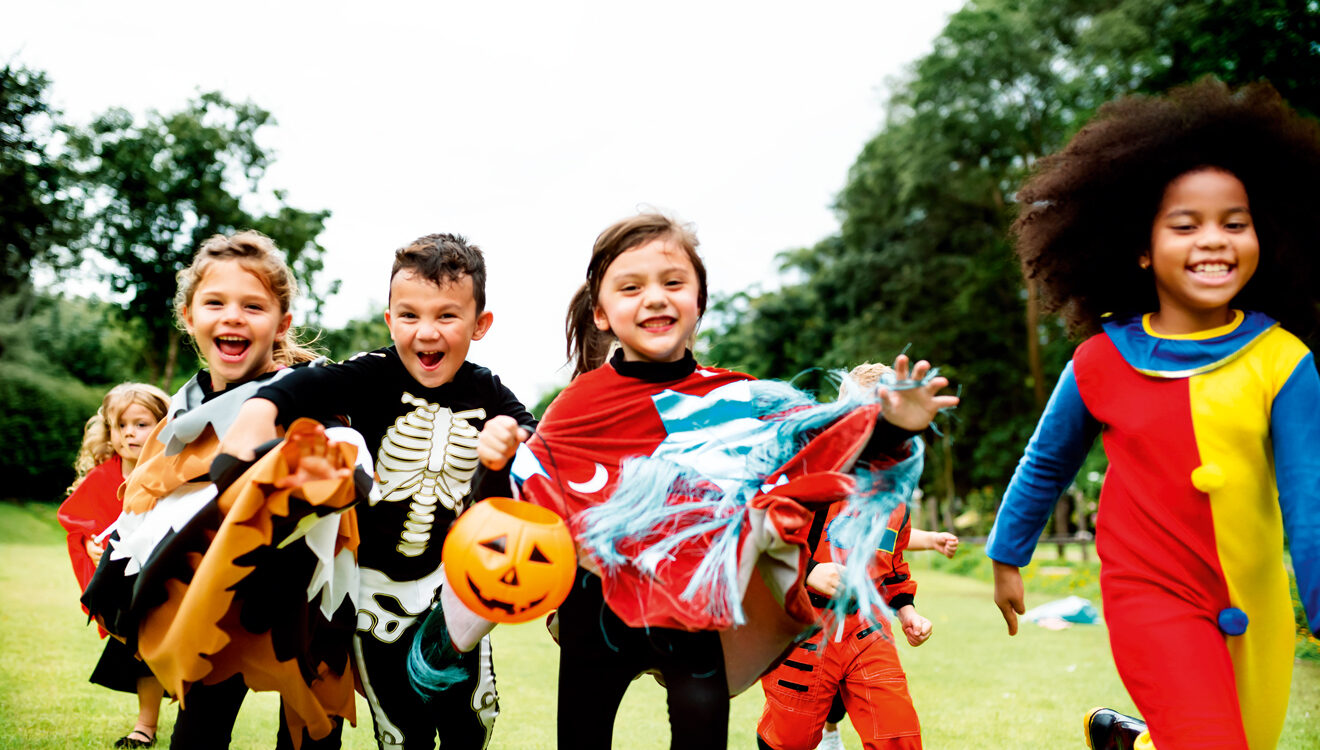 Kids running in costumes