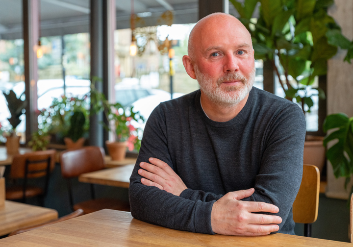 Richard Eastwood sitting at a table