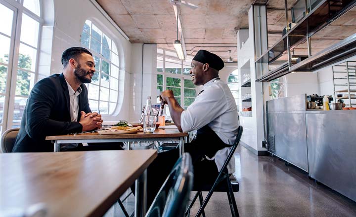 Chef and owner talking