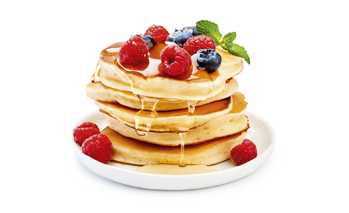 Stack of pancakes with fruit