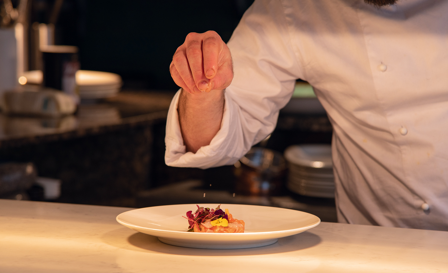 Chef putting finishing touches to dish at Liverpool's Il Forno