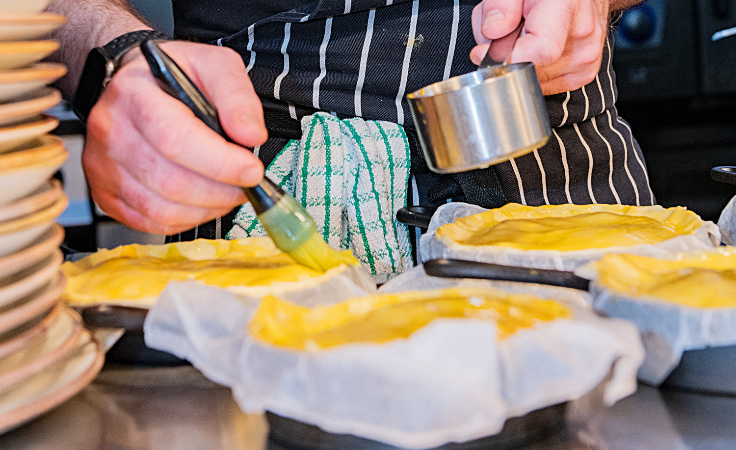 Sam Taylor preparing pastry pies