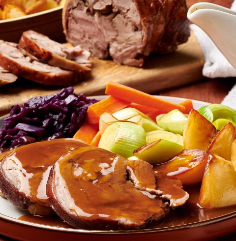 Roast lamb with rhubarb and cider gravy