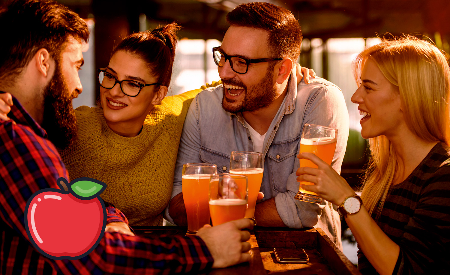 Group of friends enjoying pints of cider