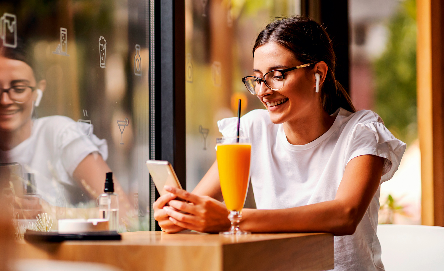 Woman in cafe on phone